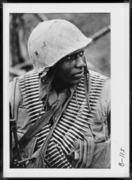 U.S. Soldier Wearing a Cartridge Belt over His Shoulder