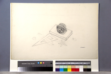 本の上の砂漠の薔薇、三角定規 画像