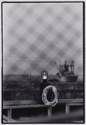 Blue Yokohama: Ship Viewed over Wire Mesh Fence